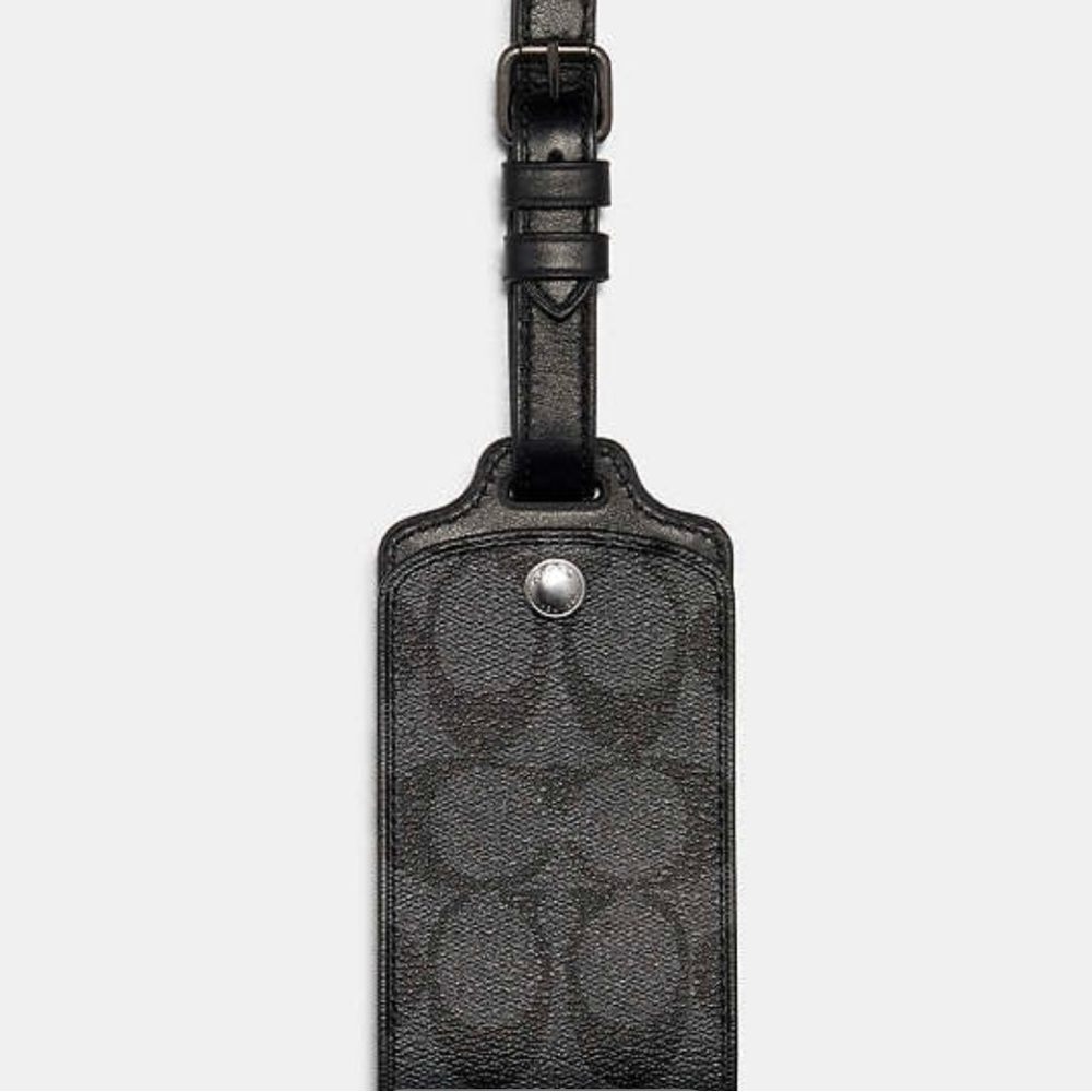 Coach luggage tag in black signature canvas